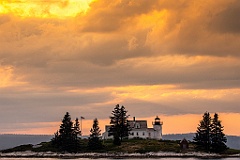 Weathered Pumpkin Island Lighthouse Under Dramatic Sunset